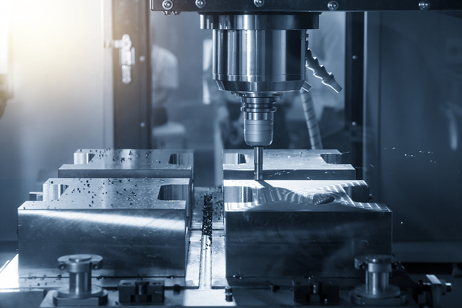 How deep can a CNC cut - The CNC milling machine cutting the mould part with the index-able radius end mill tool in roughing process.